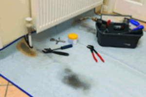 Power flushing a central heating system in Manchester